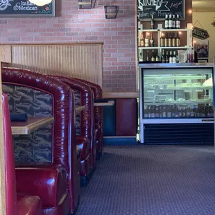 Seating area down to kitchen.