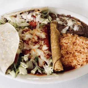The combo place: flautas, enchiladas (cheese and beef), and 2 beef tacos.