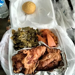 2 fried chicken breast with sweet potatoes and greens