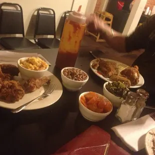 Fried chicken, yams, black eyed peas, mac n cheese, rice and greens