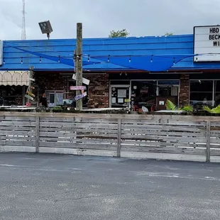 a car parked in front of a restaurant
