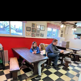a family sitting at a table