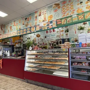 Fresh fluffy donuts, front register/checkout area.