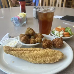 Catfish lunch with fried okra and seasonal vegetables