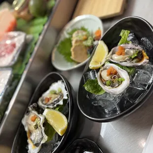 a variety of seafood dishes on a table