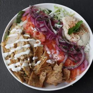 Chicken Shawarma Bowl with Creamy garlic sauce on top!