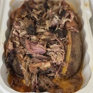 Loaded Tater...Butter,sour cream,cheese, chili beans and rib meat wholly shit this is an incredible fat ass potato!!!  it's takeout &amp; messy!