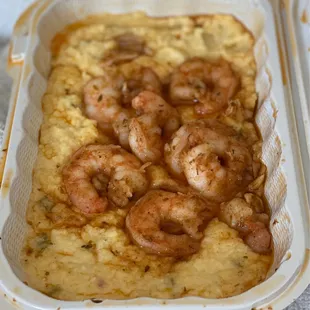 Shrimp and grits! Shrimp sautéed in cajun garlic butter on creamy cheesy pepper grits i did have naughty time with this lol ;)..