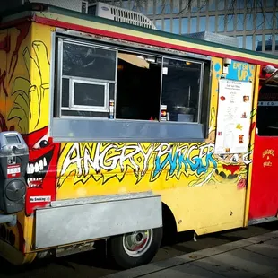 a yellow and red food truck