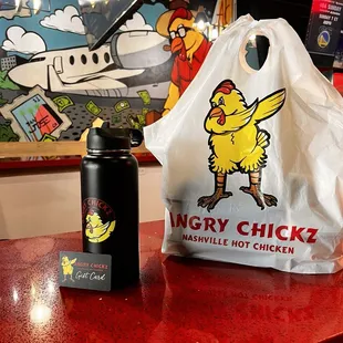 Take out, gift card and tumbler