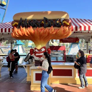 a hot dog with flames on it