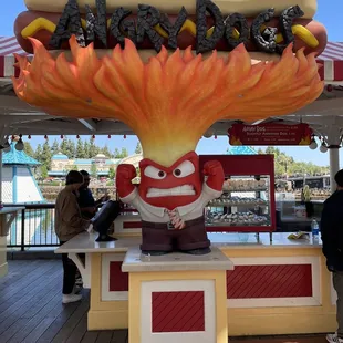 a hot dog with flames on it