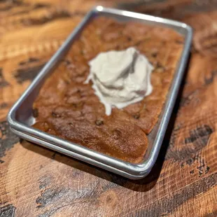 a cake with whipped cream on top