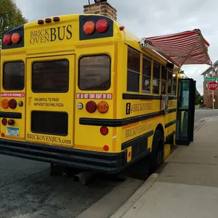 The brick oven pizza bus is visiting. Yum