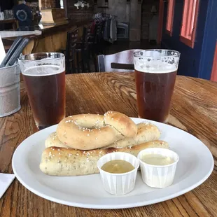 a plate of food and beer