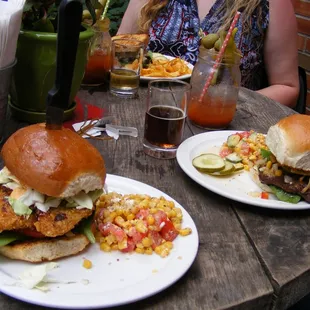 Bluegill sandwich on left, burger on right. Corn salad side