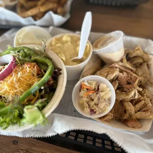 Smoked pulled chicken dinner with side salad and Mac n cheese