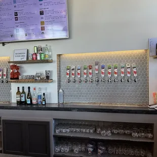 a counter with beer taps