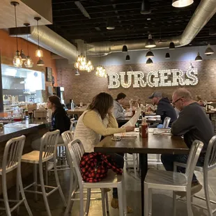 customers sitting at the bar