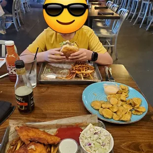 Appetizer of fried pickles which came with the house sauce. Angus Burger &amp; Fish &amp; Chips. Finished off with a brownie shake!