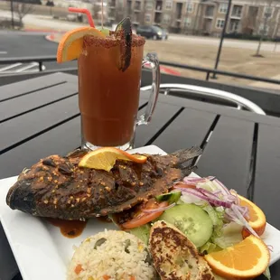 a plate of food and a drink