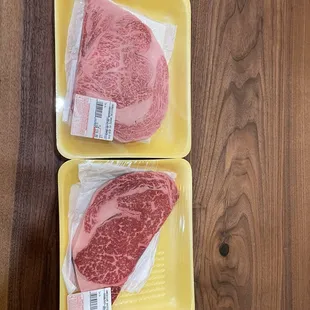 Japanese and American wagyu side by side with prices