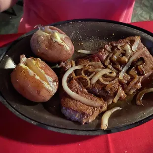 Large Ribeye and boiled potatoes