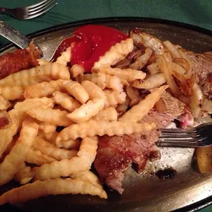 Thin steak.  $20+ meal/person.  For that money and quality, could get equivalent for less elsewhere.