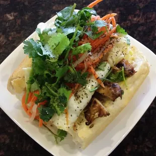Banh Mi Ga Nuong (Grilled chicken sub with a sunny side up egg)