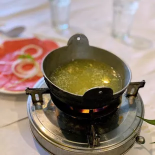 a pot of soup on a stove