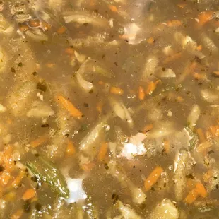 Flaki (beef tripe) soup sold in containers to go.