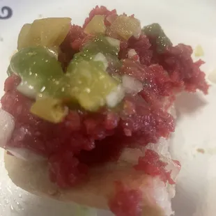 Too much food coloring in the tatar.