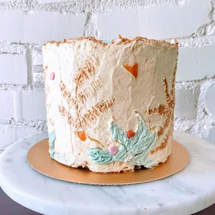 An orange cake with Russian orange and anise buttercream prepared for a friend's birthday