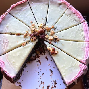 A gluten free poppy seed hazelnut cake with white chocolate ganache... to die for!!