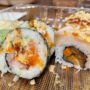 Ohlone Roll (left - this one was the better-tasting one, but it fell apart easily) and Instagram Roll (meh. Fish didn&apos;t seem fresh)