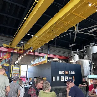 a large group of people sitting at tables