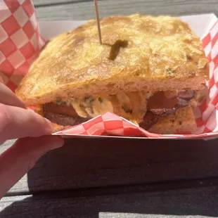 pastrami and egg breakfast sandwich on house made focaccia