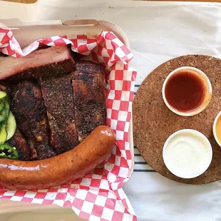 Sampler Platter! Selections can vary, but this day = ribs, hot link, pork belly and chicken drummies.