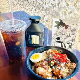 a bowl of food and a drink