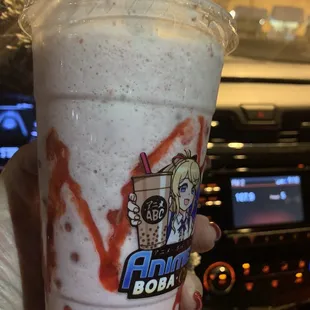 Coconut strawberry blended treat with strawberry popping pearls. Highly recommend!