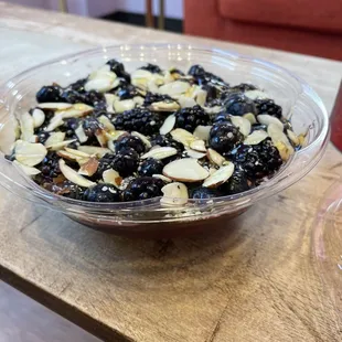 a bowl of blueberries and almonds