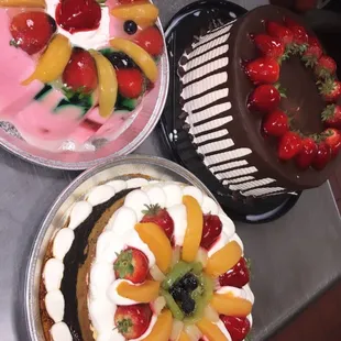 a variety of cakes on a table