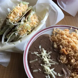 Tuesday special crispy tacos $1 each, plus a side of rice and beans