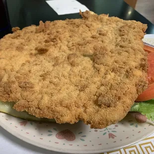 Trust me there is a bun under there some where.  Great tenderloin sandwich