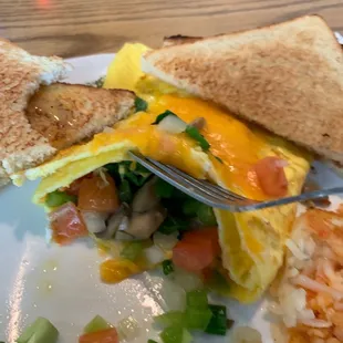 A very full veggie omelet!