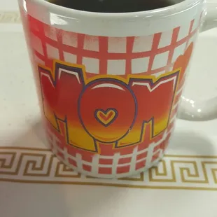 Random coffee cups.  Not too proud to drink from a mug that says "Mom", haha.