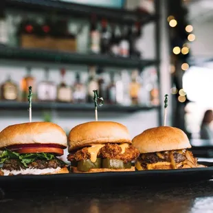 Slider Trio - cheeseburger, crispy chicken sandwich, lamb burger - now available in Ferndale!