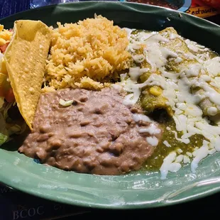 Anita's plate, with Chicken Enchilada Verdes. Homemade crispy taco. Delicious