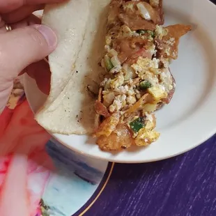 Migas $2.59, nice spice to it.