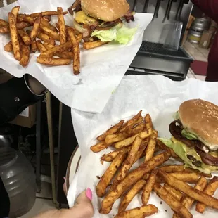 Delicious burgers with bacon and fries  I also really enjoy the molcajetes